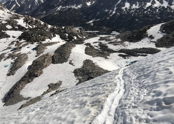 Glen Pass. If you slipped and fell here that would be very, very bad. Ice axe and crampons = required equipment