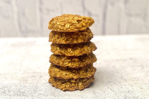 big stack of pumpkin protein cookies