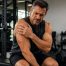 Man in gym with injury in shoulder