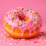 High-protein pink donut with 20 grams of protein — example of ultra-processed protein snack food.