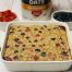 high protein double berry baked oatmeal in baking dish